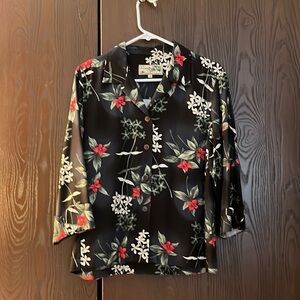 Havana Jack’s Cafe black blouse with red and white tropical flowers. Size Med